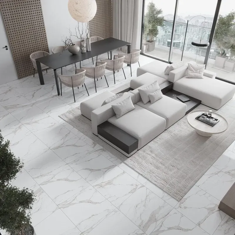 Một phòng khách hiện đại với sàn đá marble lát nền nhà đẹp màu trắng vân xám, kết hợp với nội thất tối giản tạo không gian tinh tế, rộng rãi.